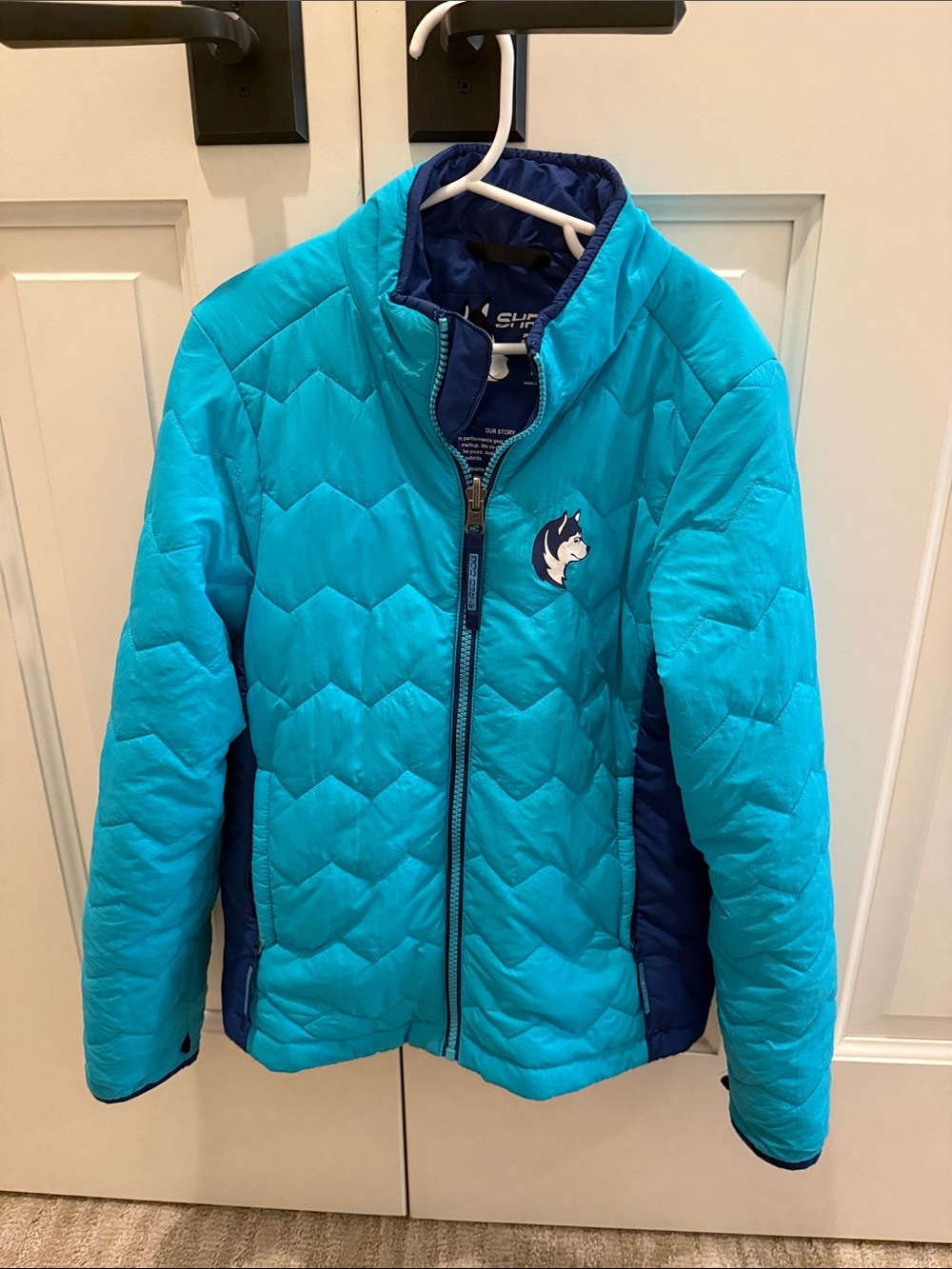Kids Turquoise Puffer Jacket with Navy Panels and Husky Patch